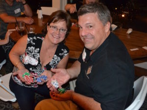 RentDirect Nationwide's Karen Bunch and Rental Salesworks' Eric Moore show their winnings