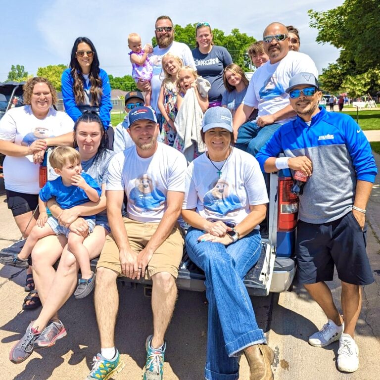 Team members from all three Fosdick businesses – Premier Rental-Purchase, Mr. Appliance, and Glass Doctor – gather for the annual NEBRASKAland Days parade in 2023.