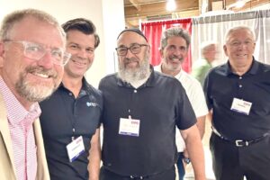 Kevin Silvers (far L) snaps a selfie with (L to R) APRO CEO Charles Smitherman, Dan Jobrack of DATATrue LLC, Joe Hickey of Audit Advantage, and TRIB Group Executive Director Dennis Shields.