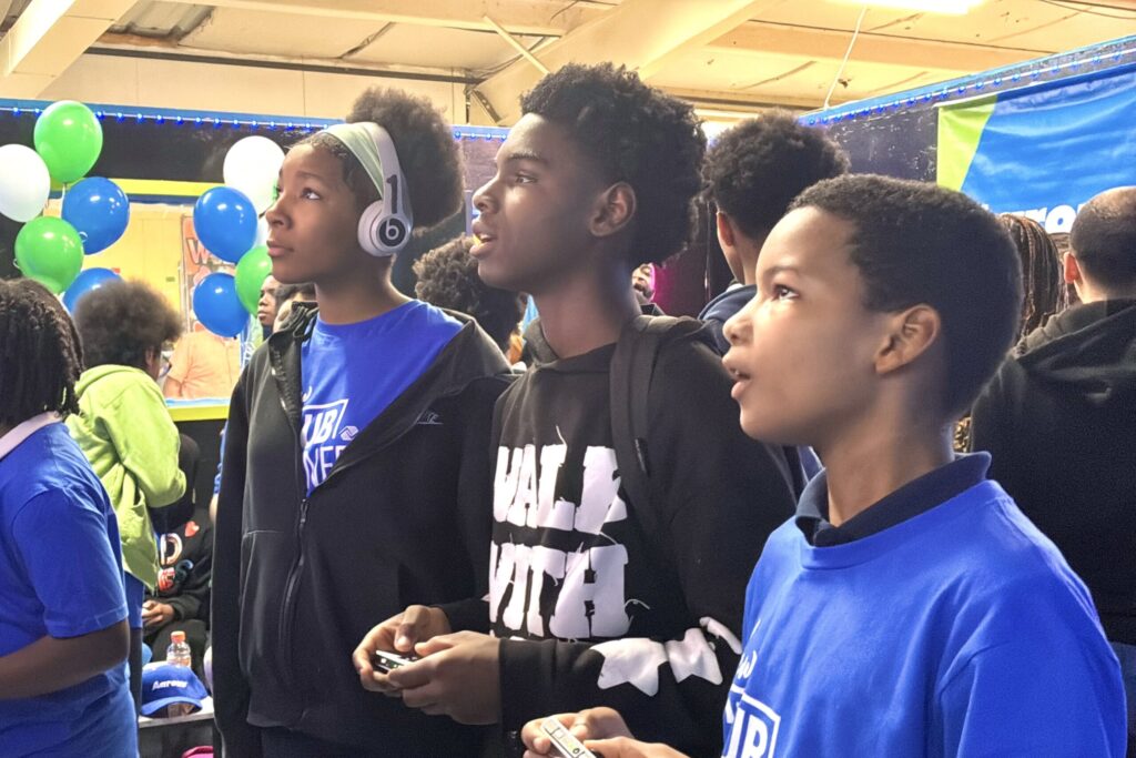 Teen members of the refreshed center enjoy their choice of three brand-new video gaming systems, all given by Aaron’s. 