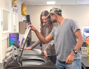 Rent-to-Own customers shopping for an affordable washer and dryer with flexible payment options.